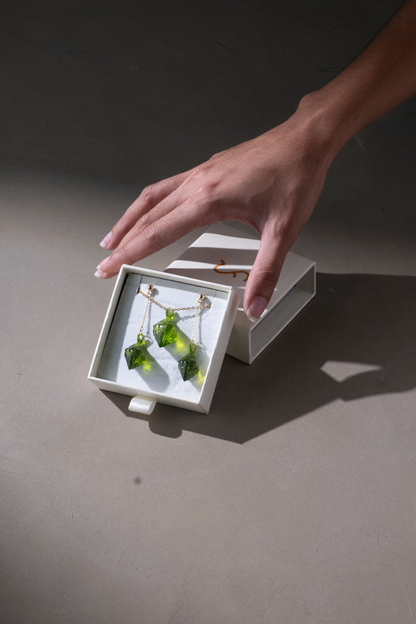 The Making Things Pusô Jewelry Collection on displayed in a box.