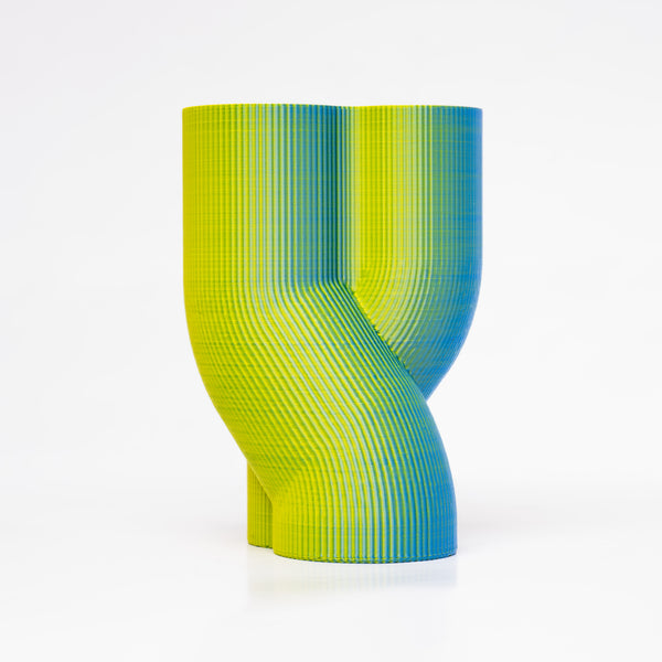 A 3D-printed iridescent vase that changes from blue to green and vice versa.